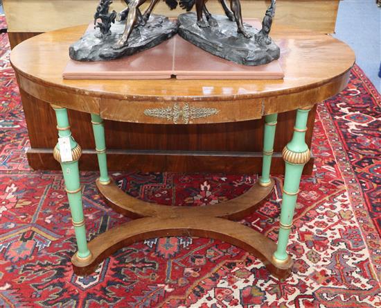 An Empire style oval painted gilt metal mounted mahogany centre table W.108cm
